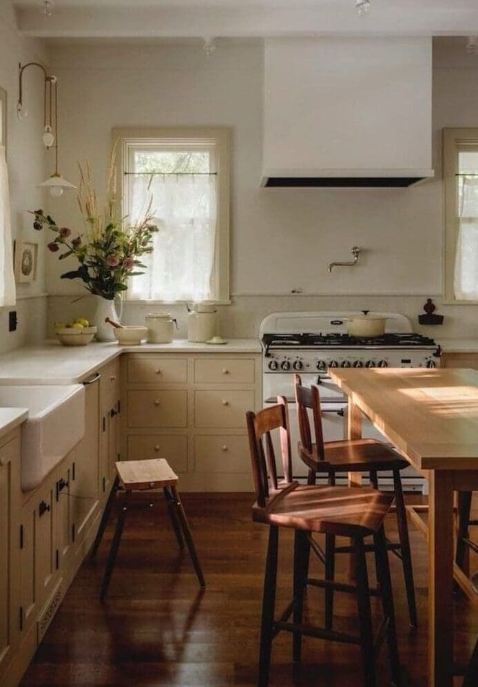 Shaker style classic kichen with cream cabinets, historic home, wood freestanding island by Jessica Helgerson Interior Design
