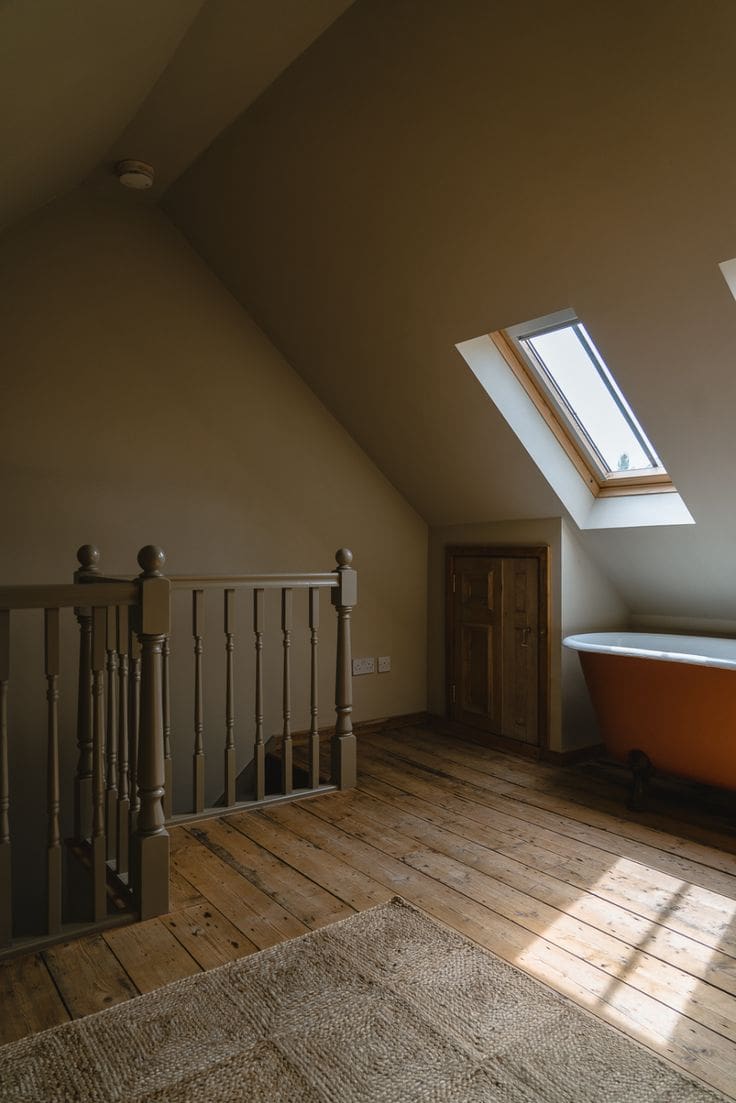 Historic English Bathroom in attic with slanted ceiling